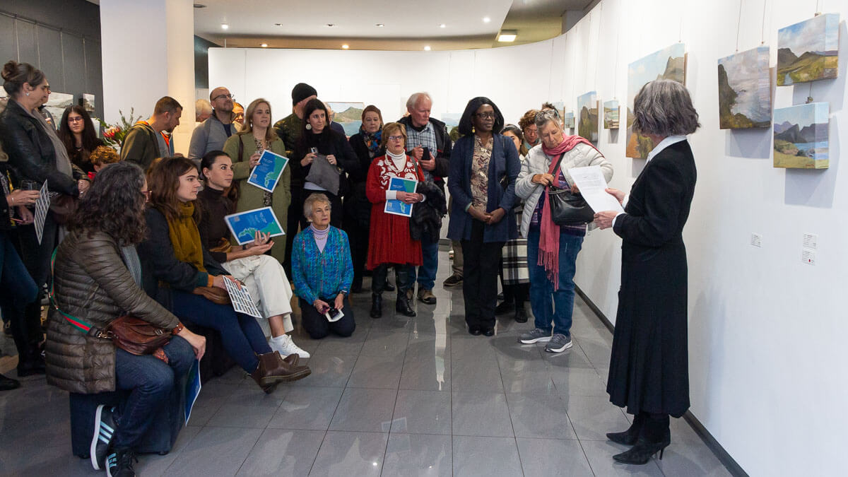 Jennifer Reynolds welcomes guests to StateoftheART for the Opening of 'Here I Find'.